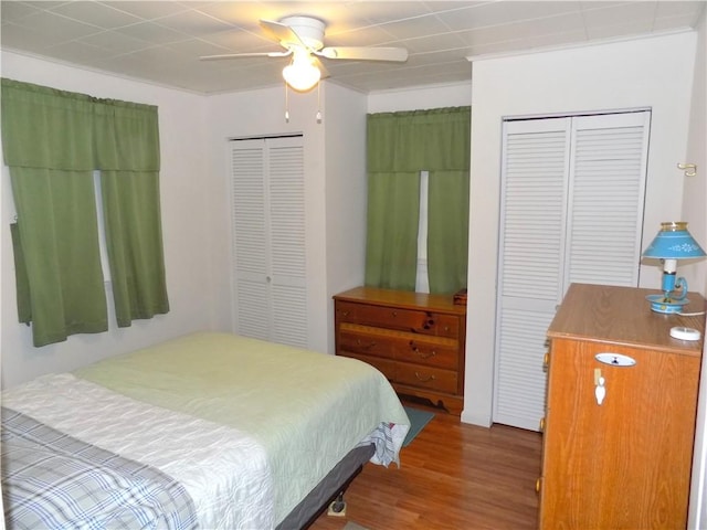 215 Maple St, Carmichaels/Cumblnd, PA 15320 - bedroom featuring two closets, wood finished floors, and a ceiling fan