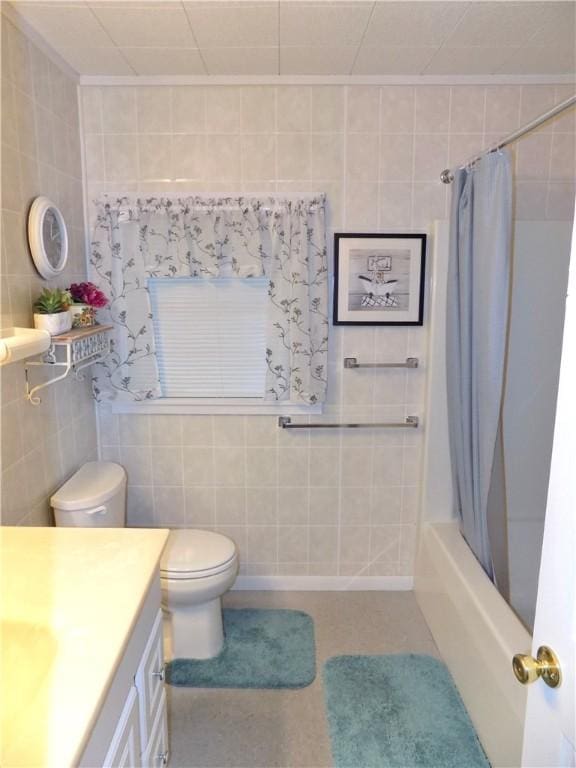 215 Maple St, Carmichaels/Cumblnd, PA 15320 - full bathroom featuring toilet, tile walls, shower / bath combo with shower curtain, and vanity