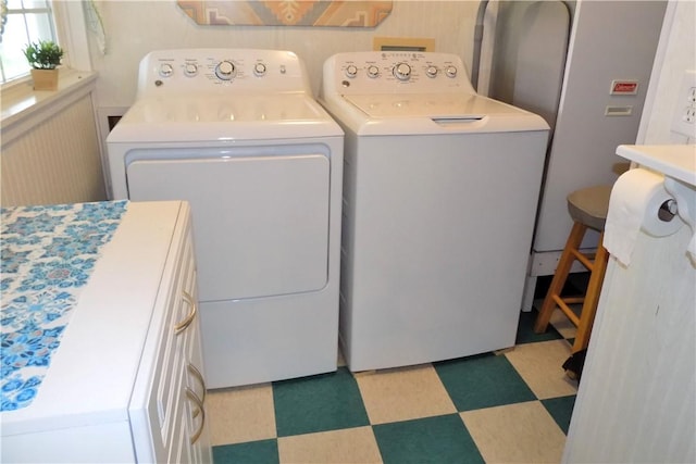 215 Maple St, Carmichaels/Cumblnd, PA 15320 - laundry area with washing machine and dryer and light floors