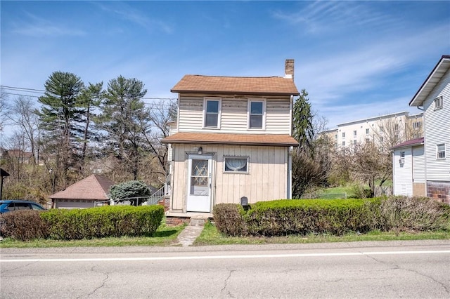 627 Rostraver Rd, Belle Vernon, PA 15012 - view of front of property with a chimney and a shingled roof