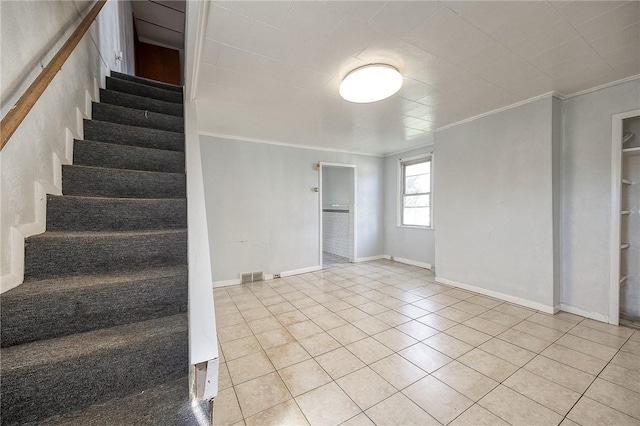 627 Rostraver Rd, Belle Vernon, PA 15012 - staircase with crown molding, baseboards, visible vents, and tile patterned floors