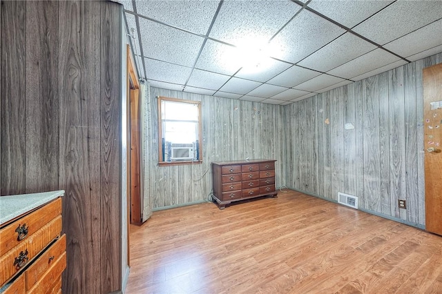 627 Rostraver Rd, Belle Vernon, PA 15012 - bedroom with visible vents, a drop ceiling, wood finished floors, and cooling unit