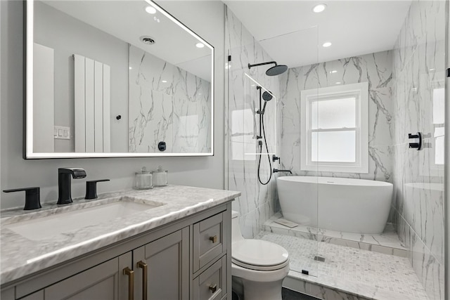 bathroom featuring toilet, a marble finish shower, vanity, and recessed lighting