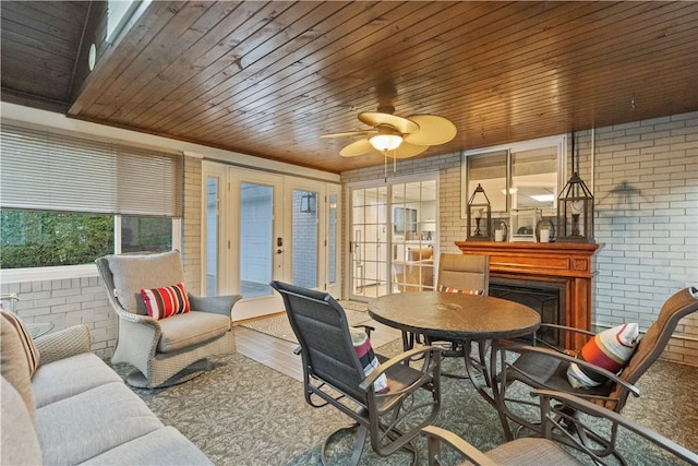 sunroom featuring french doors