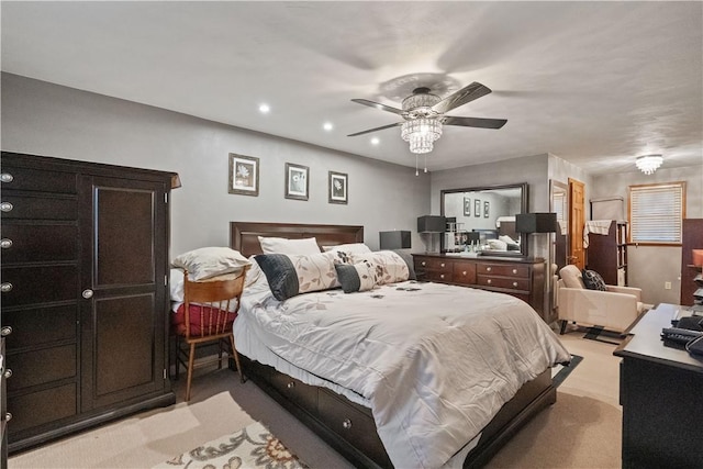bedroom with light colored carpet, a ceiling fan, and recessed lighting