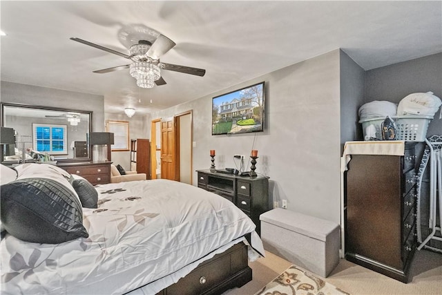 carpeted bedroom featuring a ceiling fan