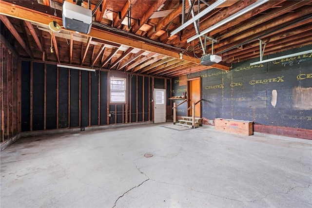 interior space featuring unfinished concrete flooring