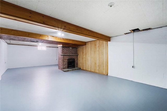 finished below grade area with a fireplace