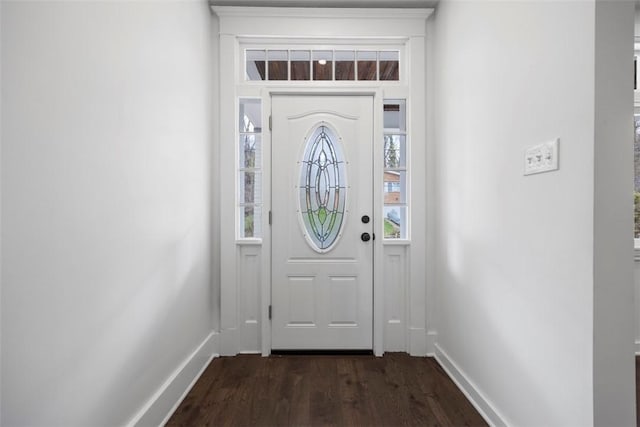 1523 Westmoreland Ave, Lincoln-Larimer, PA 15206 - foyer with baseboards and dark wood finished floors