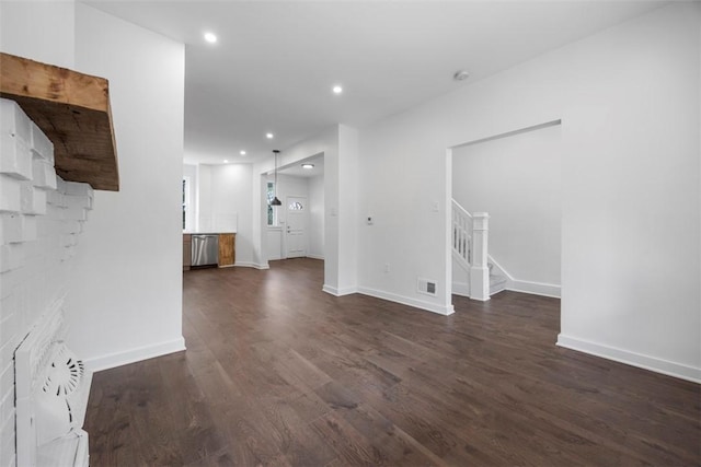 1523 Westmoreland Ave, Lincoln-Larimer, PA 15206 - unfurnished living room with visible vents, baseboards, dark wood-style floors, stairway, and recessed lighting