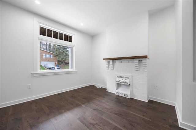 1523 Westmoreland Ave, Lincoln-Larimer, PA 15206 - unfurnished living room with baseboards, recessed lighting, wood finished floors, and a fireplace