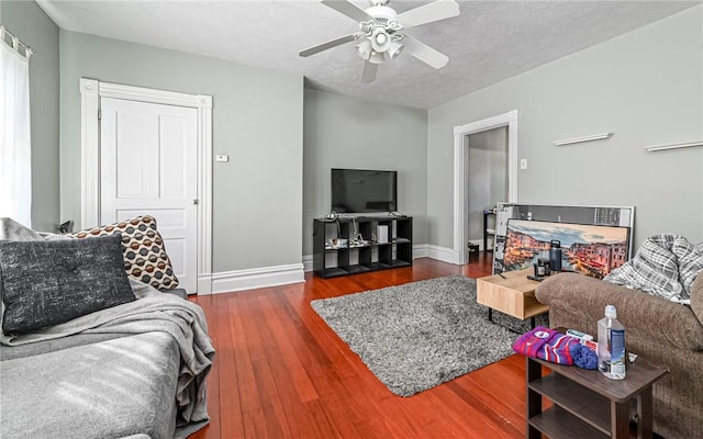 49 Sterling, South Side, PA 15203 - living room with ceiling fan, wood finished floors, and baseboards