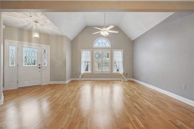 325 Village Green Dr, Peters Twp, PA 15317 - foyer entrance featuring light wood-style flooring, vaulted ceiling, baseboards, and ceiling fan with notable chandelier
