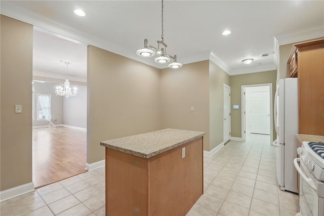 325 Village Green Dr, Peters Twp, PA 15317 - kitchen with white appliances, ornamental molding, a center island, light tile patterned flooring, and a notable chandelier