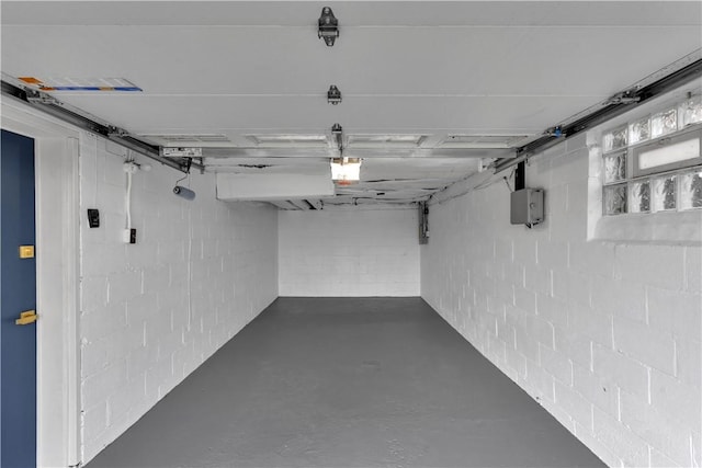 garage featuring concrete block wall