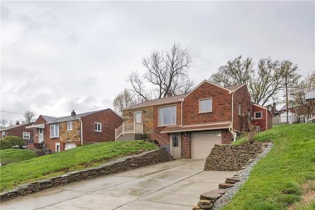 view of front of property with a front lawn, brick siding, an attached garage, driveway, and a residential view
