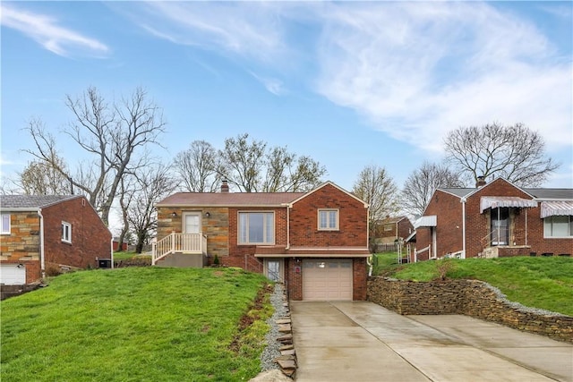 view of front of home with concrete driveway, a chimney, a front lawn, brick siding, and a garage