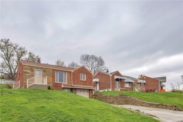 ranch-style home with a front yard, an attached garage, brick siding, and a chimney