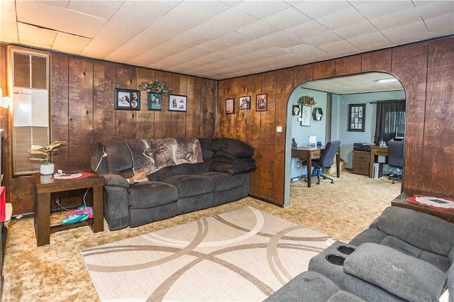 448 E Main St, Dayton, PA 16222 - living area with carpet flooring, arched walkways, and wooden walls