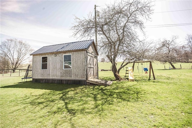 448 E Main St, Dayton, PA 16222 - view of yard featuring an outbuilding, a trampoline, and a shed