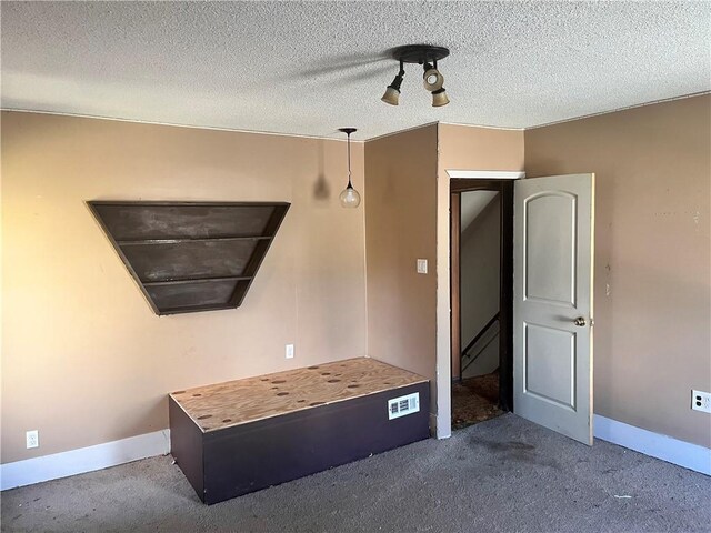 506 E Division St, New Castle/5Th, PA 16101 - unfurnished bedroom featuring carpet, a textured ceiling, and baseboards