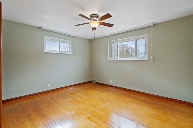 126 Peony Ave, Ross Twp, PA 15229 - spare room featuring a ceiling fan, visible vents, baseboards, and light wood-style floors