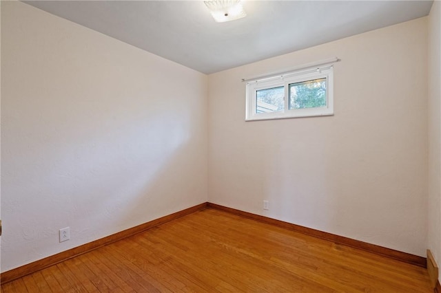 126 Peony Ave, Ross Twp, PA 15229 - unfurnished room with baseboards and light wood-style flooring