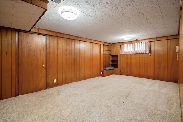 126 Peony Ave, Ross Twp, PA 15229 - basement featuring wooden walls and carpet flooring