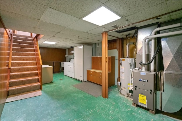 126 Peony Ave, Ross Twp, PA 15229 - finished below grade area with a paneled ceiling, stairway, independent washer and dryer, heating unit, and water heater