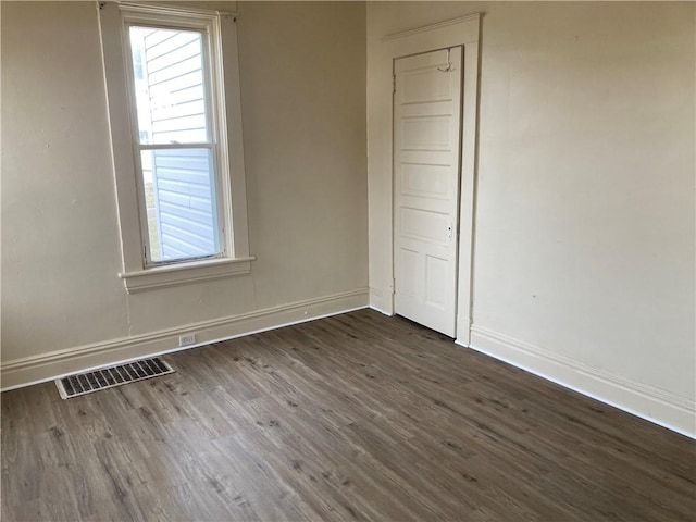 129 Park Ave, New Castle/2Nd, PA 16101 - unfurnished room featuring baseboards, dark wood-style floors, and visible vents