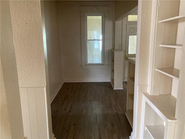 129 Park Ave, New Castle/2Nd, PA 16101 - hallway featuring built in features, a wainscoted wall, and wood finished floors