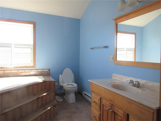 full bath featuring vanity, baseboard heating, vaulted ceiling, and toilet