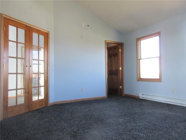 empty room featuring baseboards, baseboard heating, french doors, carpet flooring, and lofted ceiling