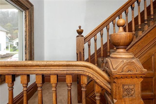 stairway with carpet flooring