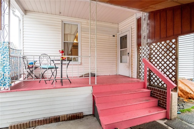 wooden terrace with covered porch