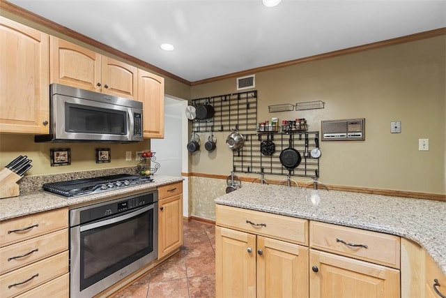 kitchen with visible vents, ornamental molding, light brown cabinetry, light stone counters, and appliances with stainless steel finishes