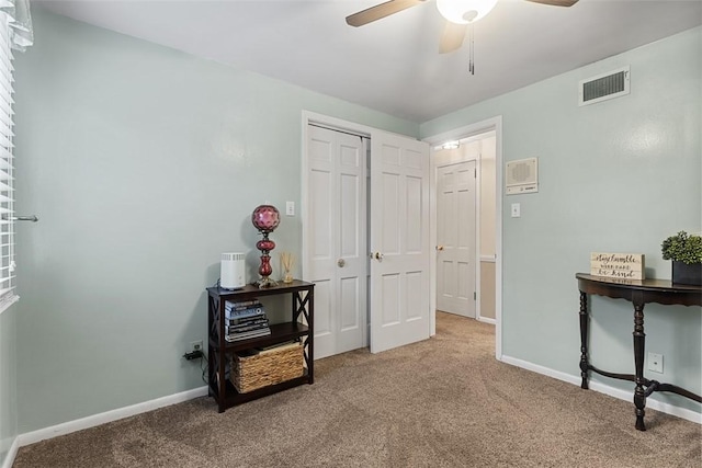 bedroom featuring visible vents, carpet flooring, and baseboards