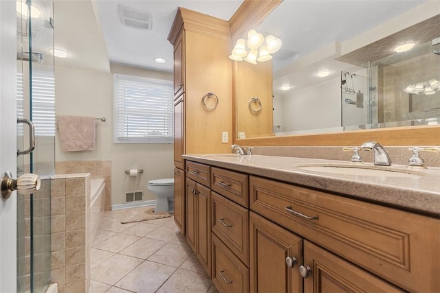 full bathroom with visible vents, a sink, tile patterned floors, and a stall shower