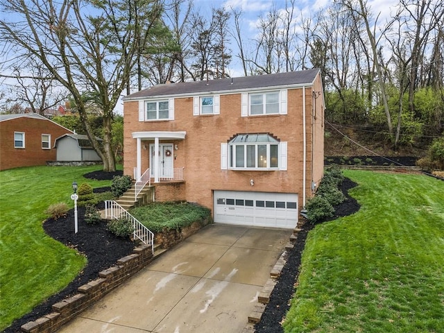 view of front facade featuring brick siding, a garage, a front yard, and concrete driveway