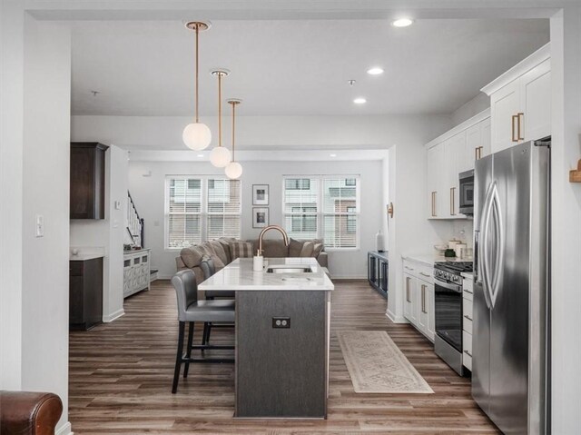 308 Thurgood Dr, Marshall, PA 15086 - kitchen with open floor plan, a sink, dark wood finished floors, and stainless steel appliances