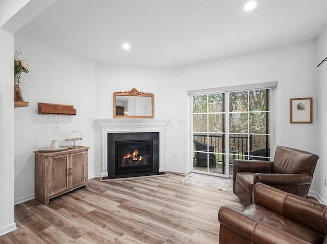 308 Thurgood Dr, Marshall, PA 15086 - interior space featuring recessed lighting, light wood-style floors, a fireplace with flush hearth, and baseboards