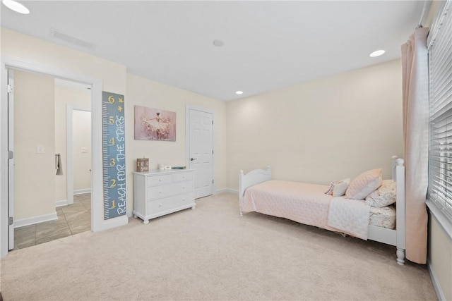 bedroom with visible vents, baseboards, recessed lighting, and light carpet