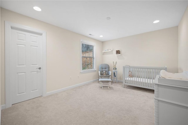 carpeted bedroom with recessed lighting and baseboards
