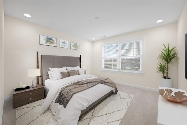carpeted bedroom with recessed lighting and baseboards
