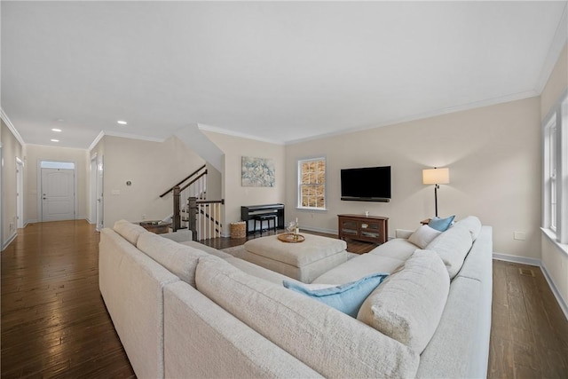 living area with recessed lighting, stairs, hardwood / wood-style flooring, ornamental molding, and baseboards