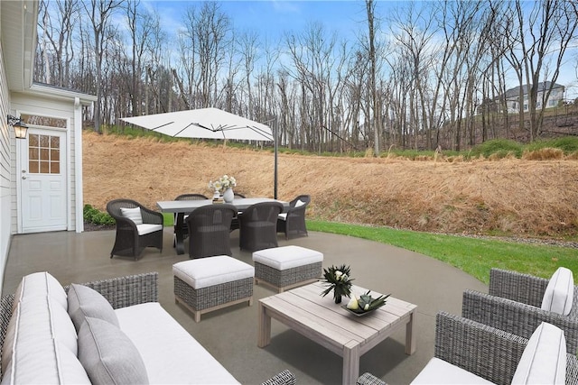 view of patio / terrace with outdoor lounge area and outdoor dining area