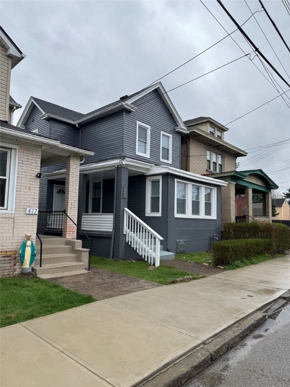 view of front of property with brick siding