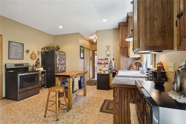 56 Hicks Rd, Donegal Twp Wsh, PA 15376 - kitchen featuring stainless steel appliances, light countertops, and recessed lighting