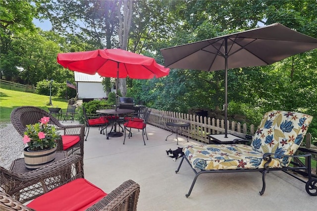 56 Hicks Rd, Donegal Twp Wsh, PA 15376 - view of patio featuring outdoor dining area and view of wooded area