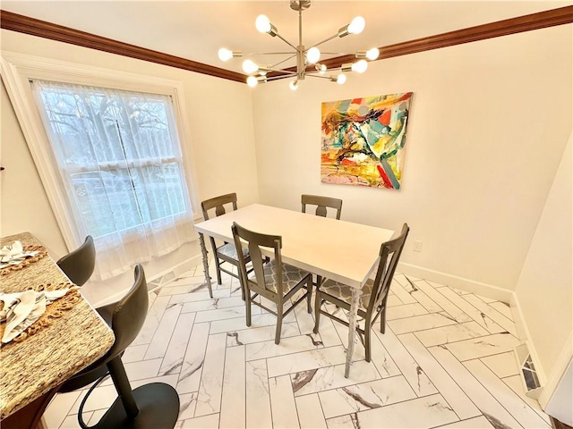 dining area with an inviting chandelier, baseboards, and ornamental molding